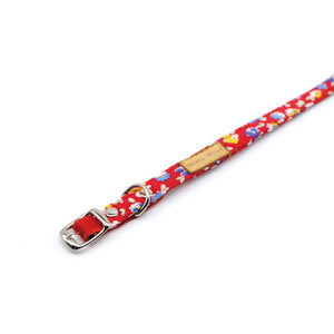 Collar gato rojo floreado - Perros Unidos